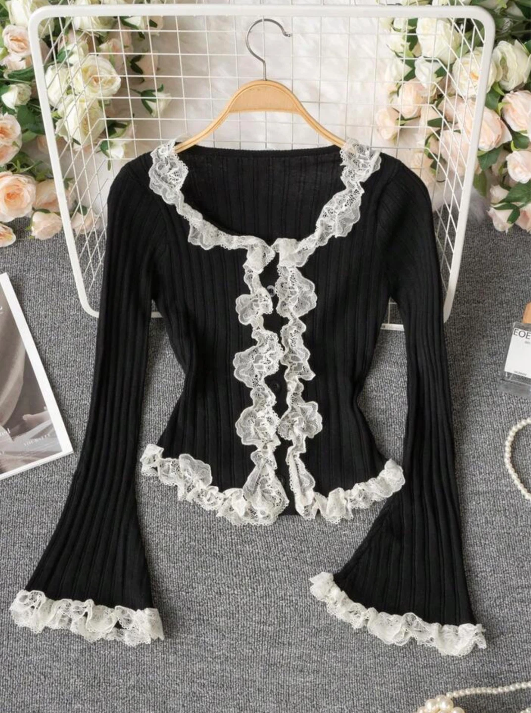 Black ribbed knit cardigan with lace trim
