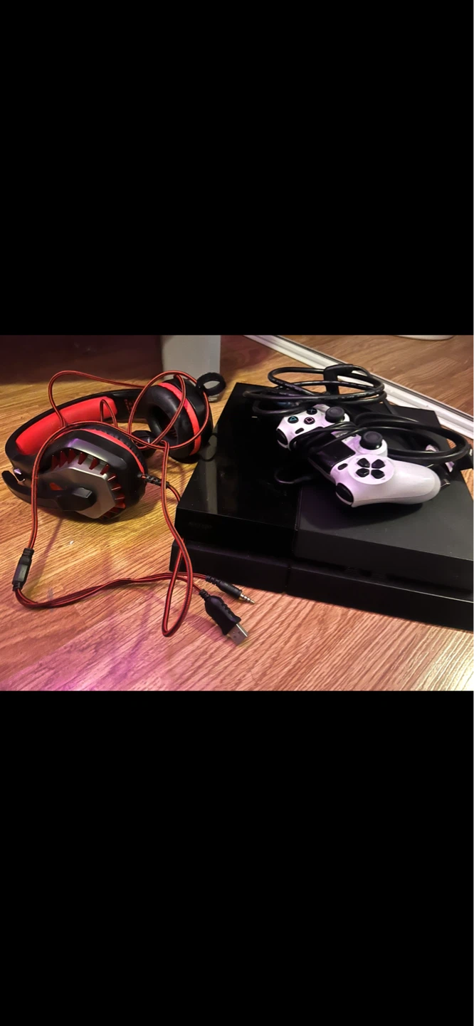 PlayStation 4 Console with headphones and Controller