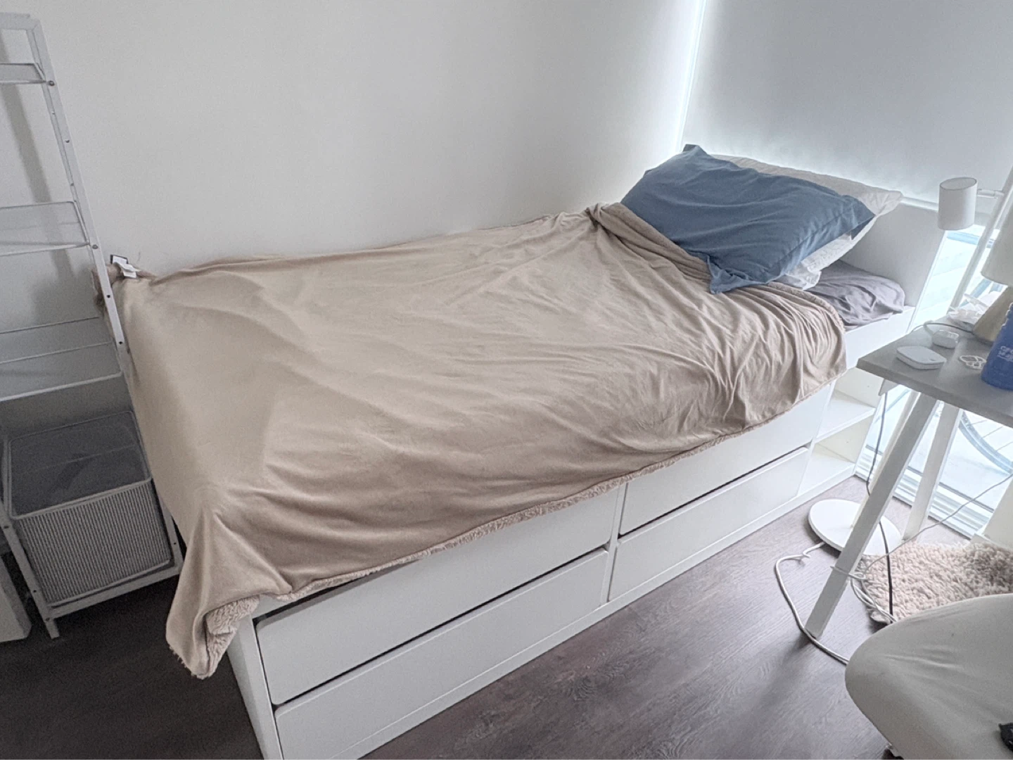 White single bed with storage