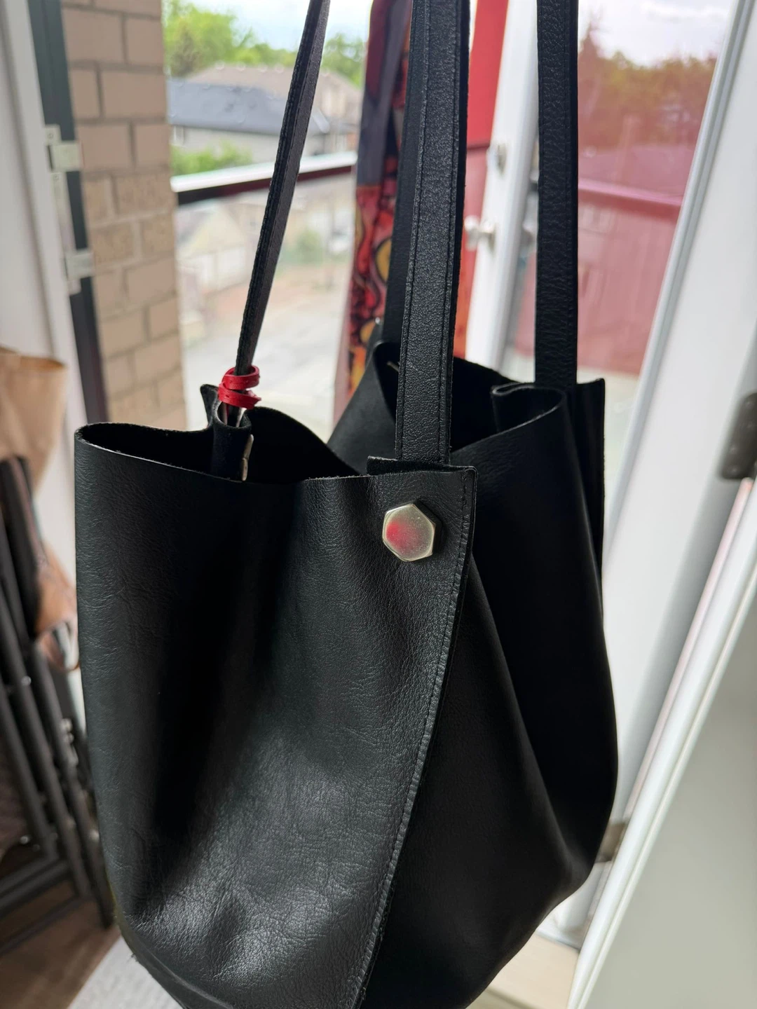 Black Leather Tote Bag with Red Heart Charm