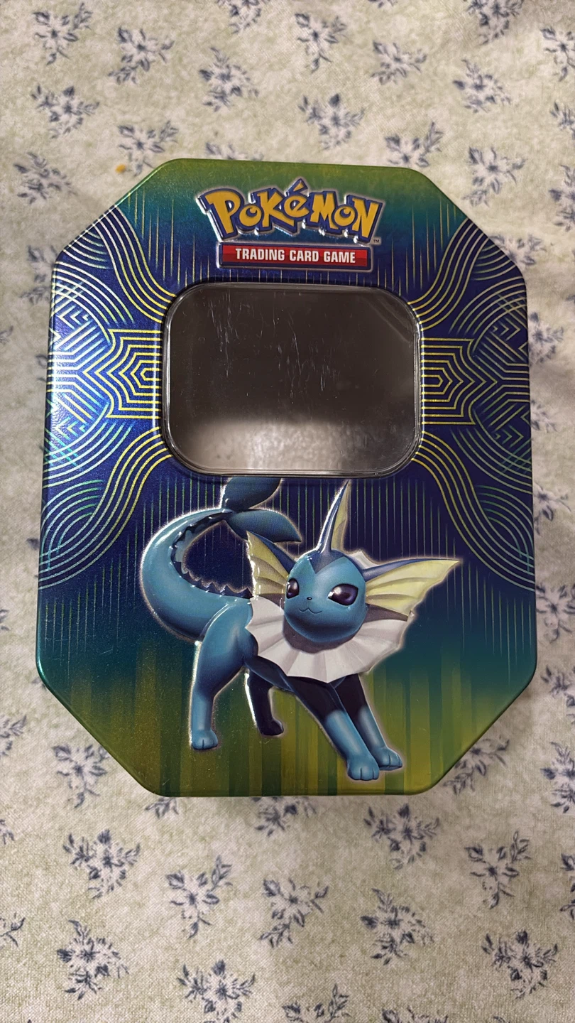 ⚽ Pokémon Trading Card Game Vaporeon Tin