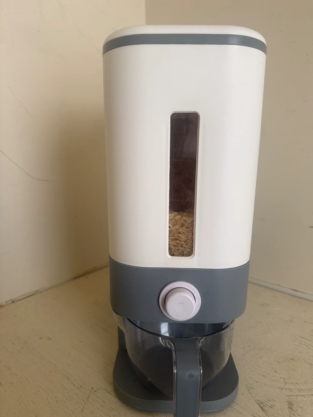 White and Gray Rice Dispenser