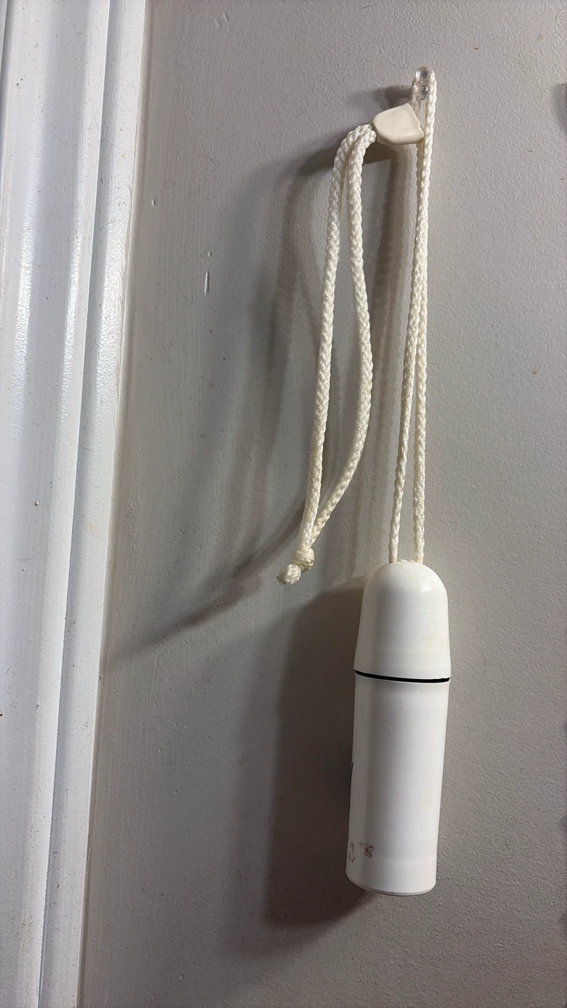 ⚽ White container with lanyard