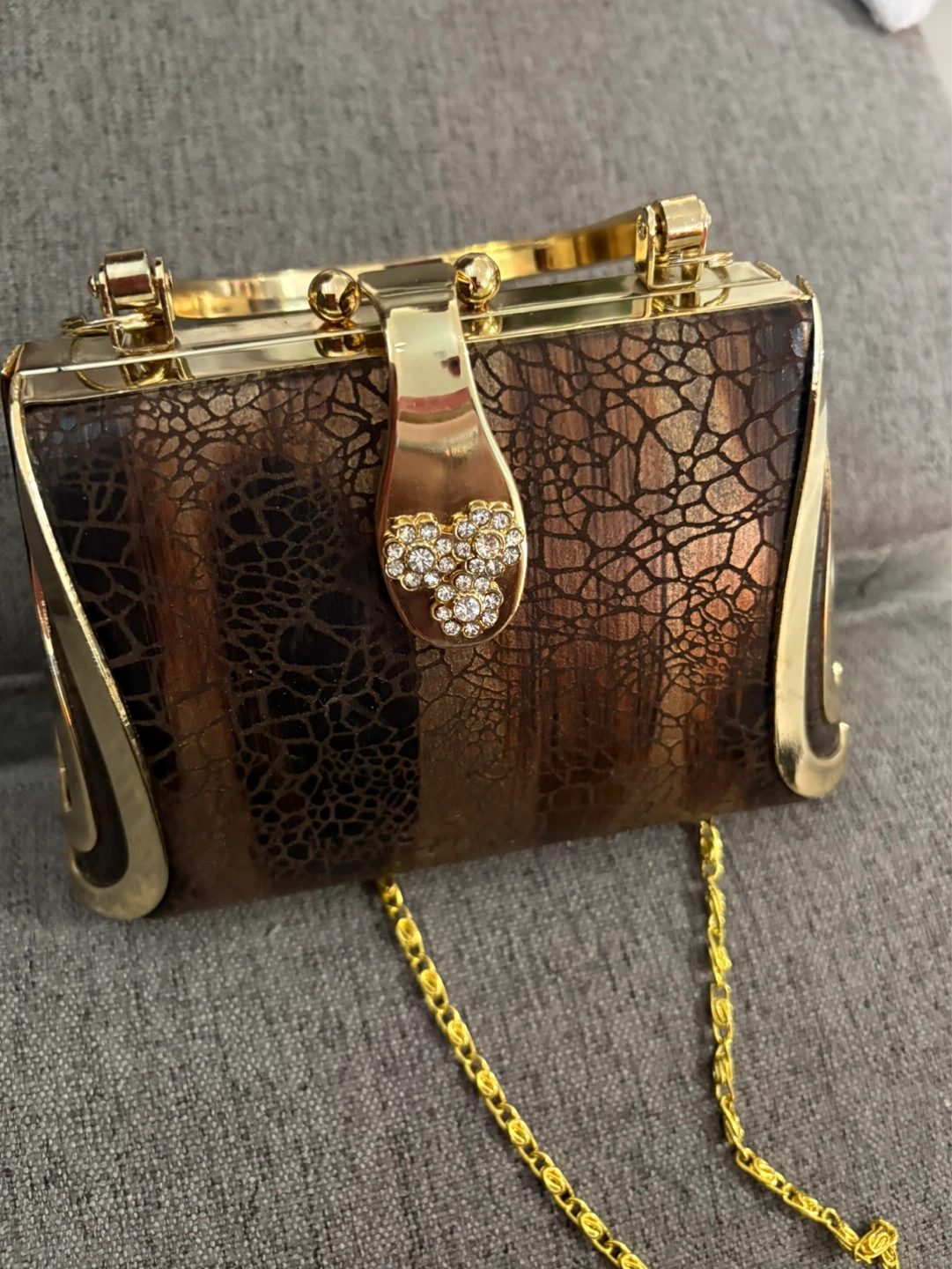 Small evening clutch with gold chain