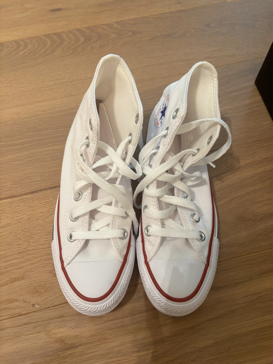 Unworn White high top Chuck Taylor Converse