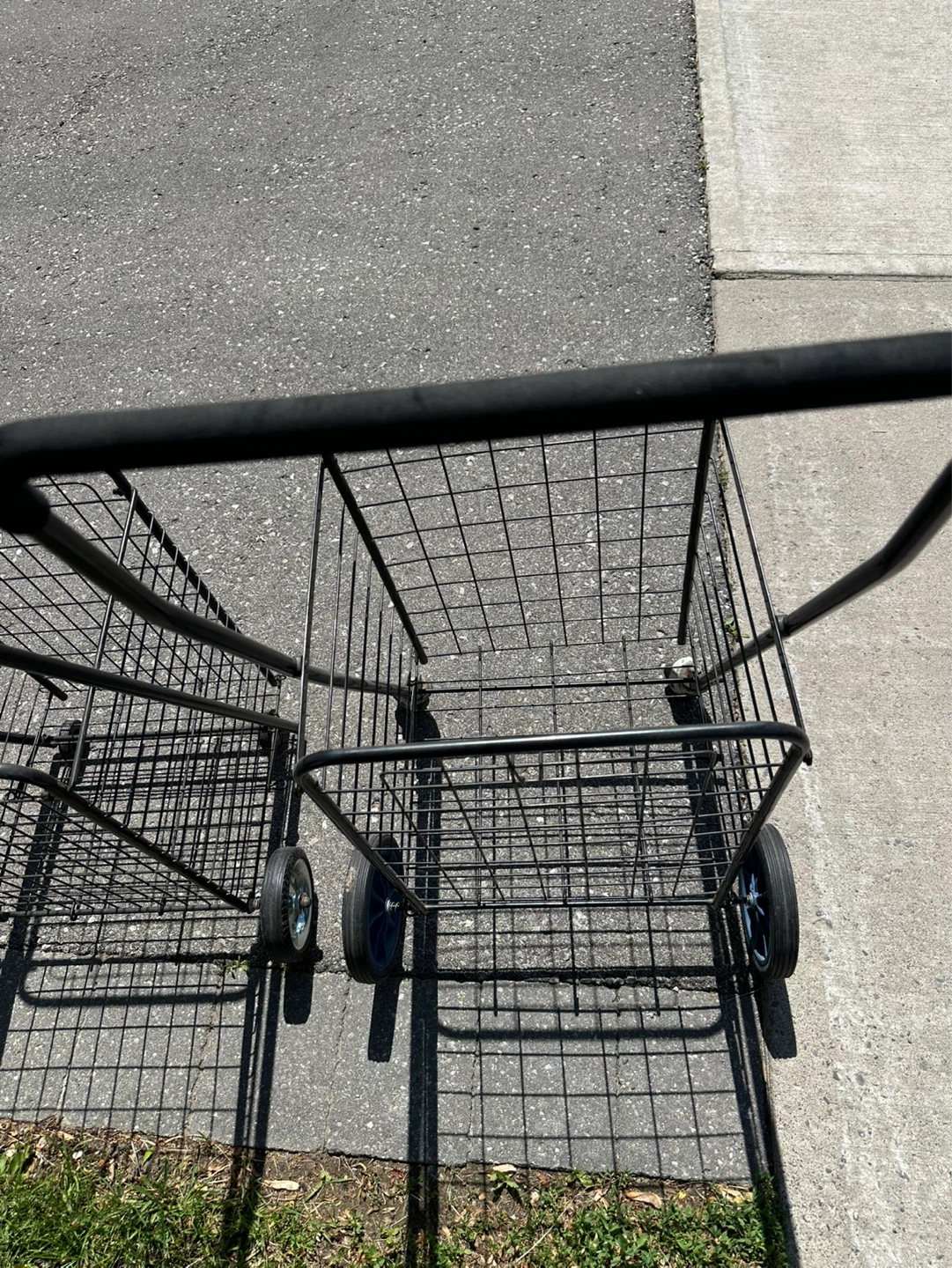 Two Black Metal Shopping Carts - photo 4