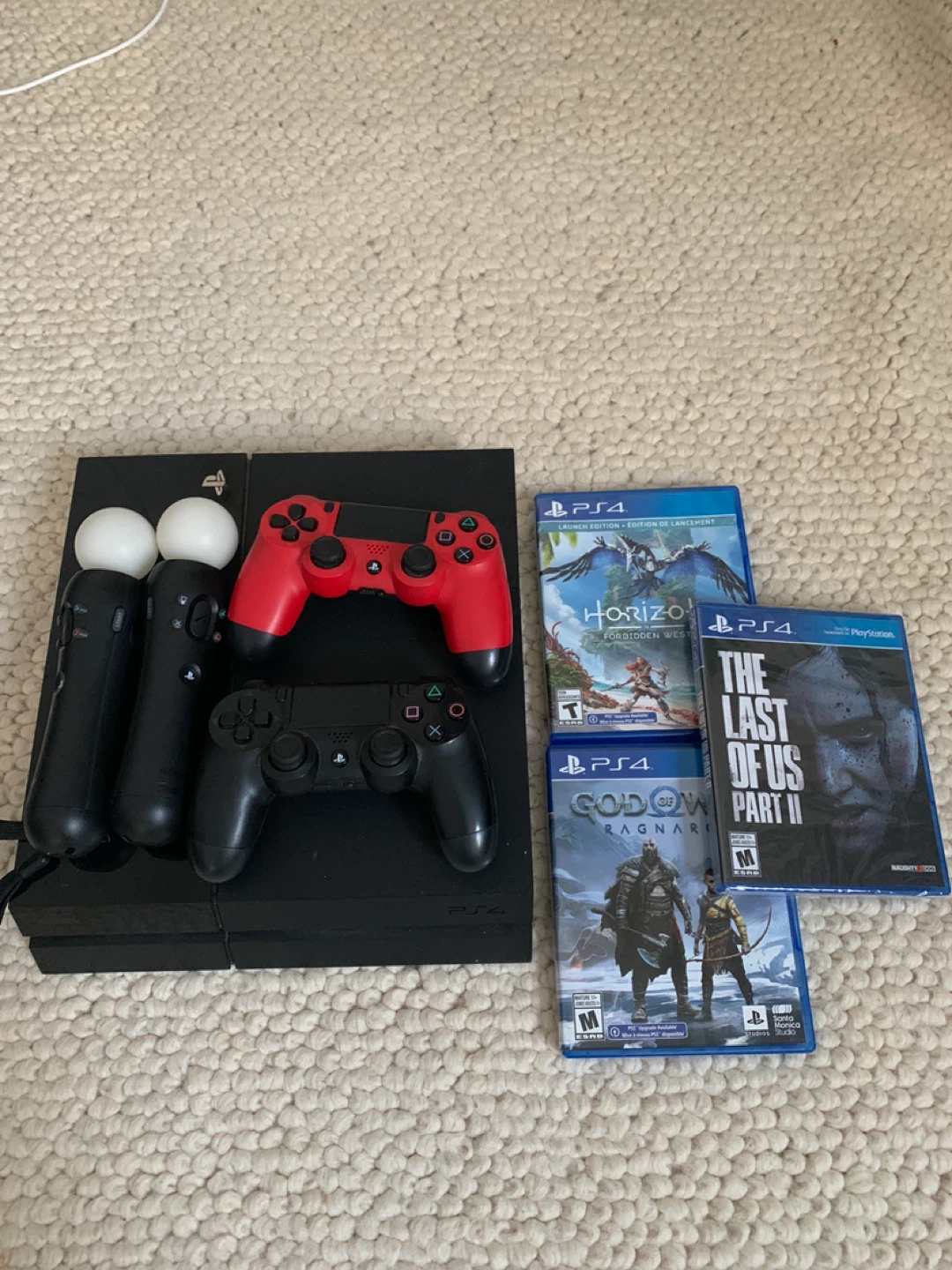 PlayStation 4 Console with 3 Games and Controllers