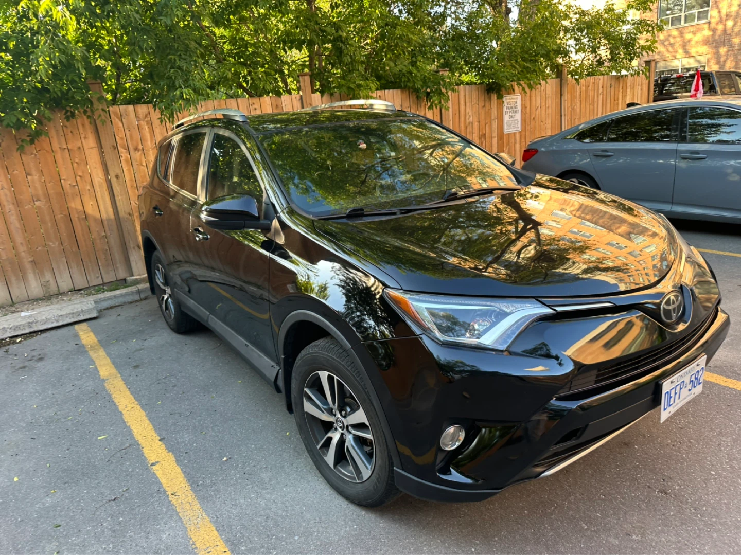 Black Toyota RAV4 SUV - photo 3