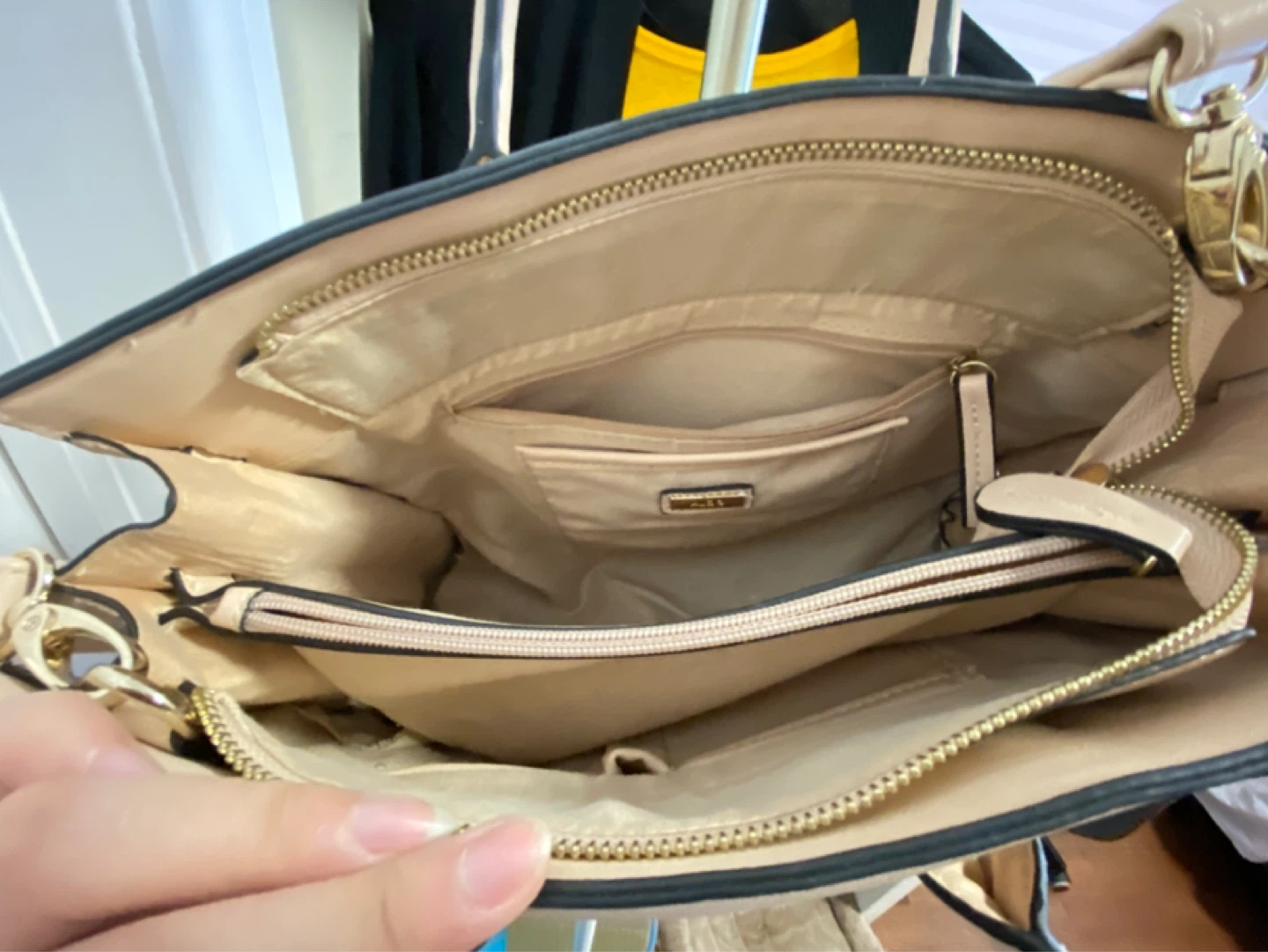 Also Beige Laser Cut Tassel Bag
