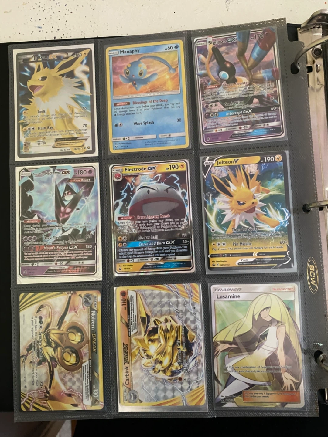 Assorted Pokemon Cards Binder - photo 2