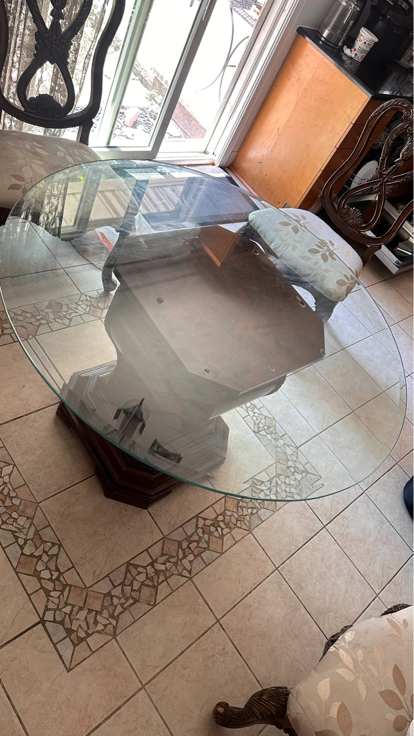 Round Glass Top Dining Table with Carved Wood Pedestal Base