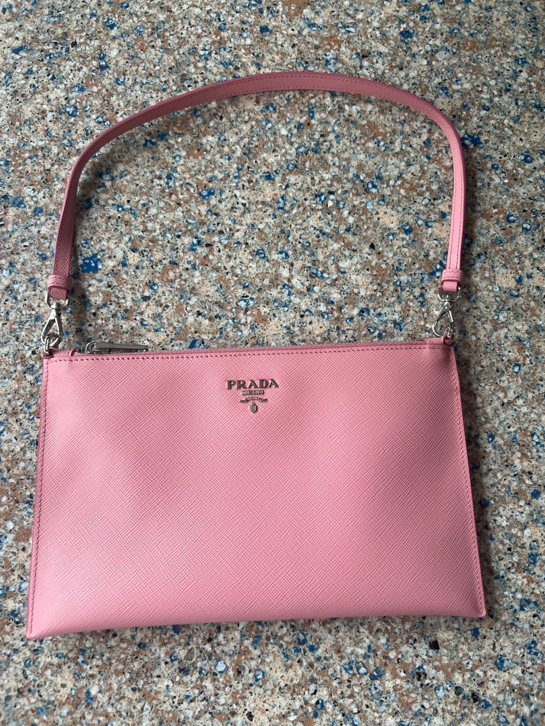Original and authentic Pink Prada Clutch Bag