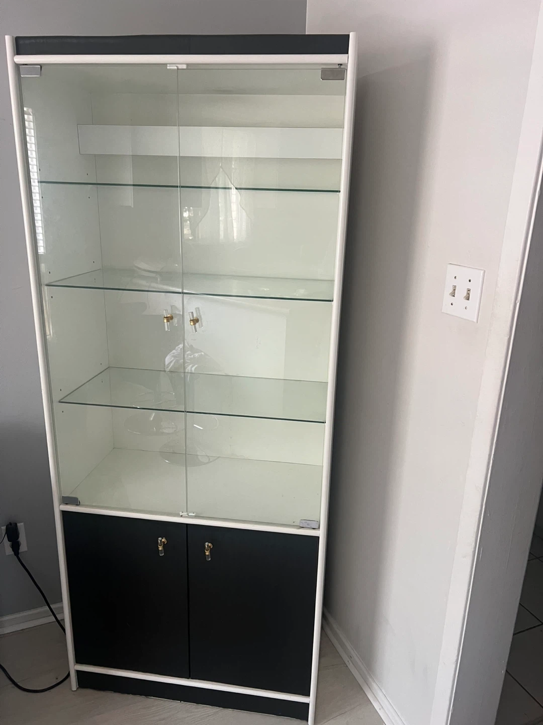 White and Black Display Cabinet with Glass Doors