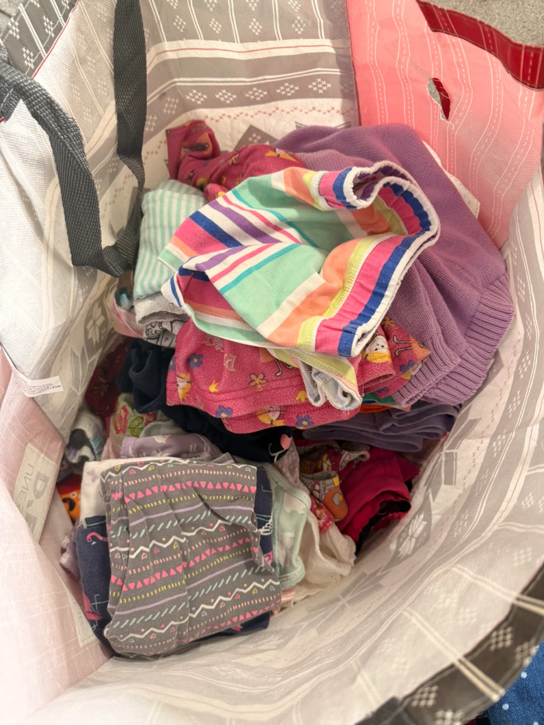 Bundle of Children's Clothing and Changing Pad