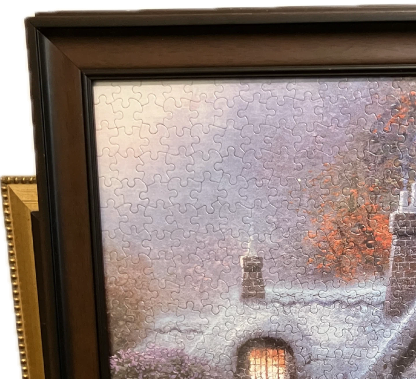 7 framed Thomas Kinkade puzzles