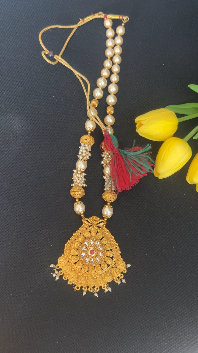 Gold Toned Pearl Necklace with Tassel