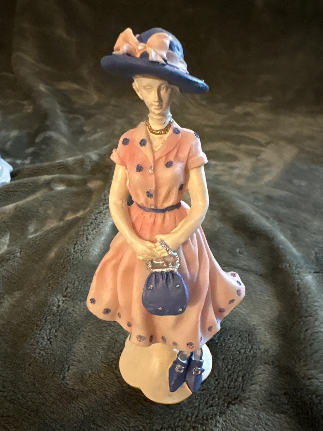 Decorative Figurine of a Woman in a Pink Dress
