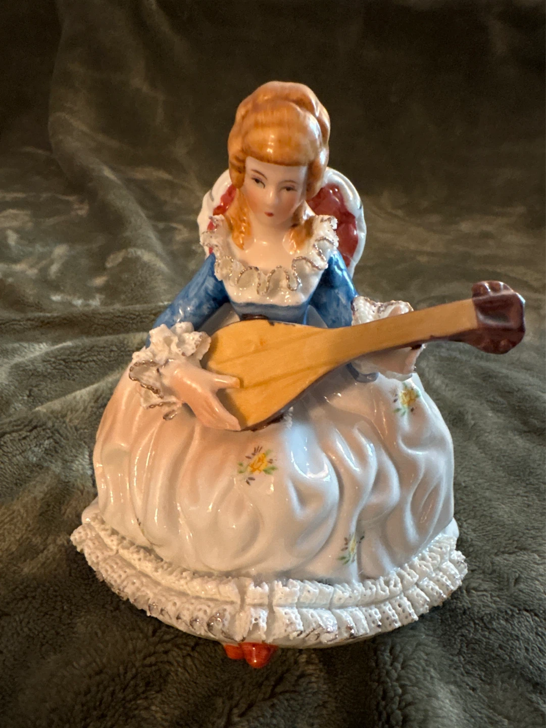 Ceramic Figurine of a Woman Playing a Lute