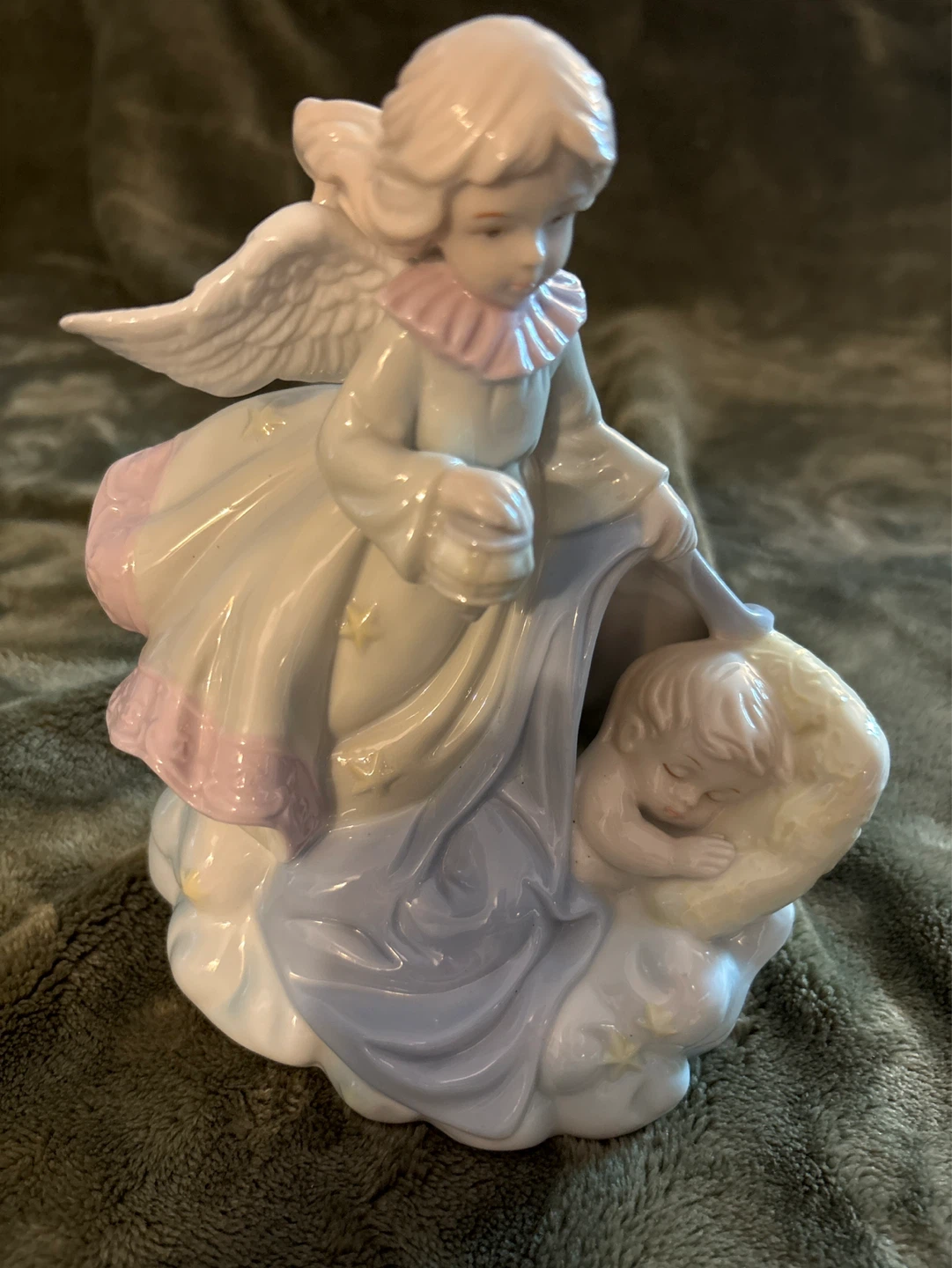 Angel figurine with baby