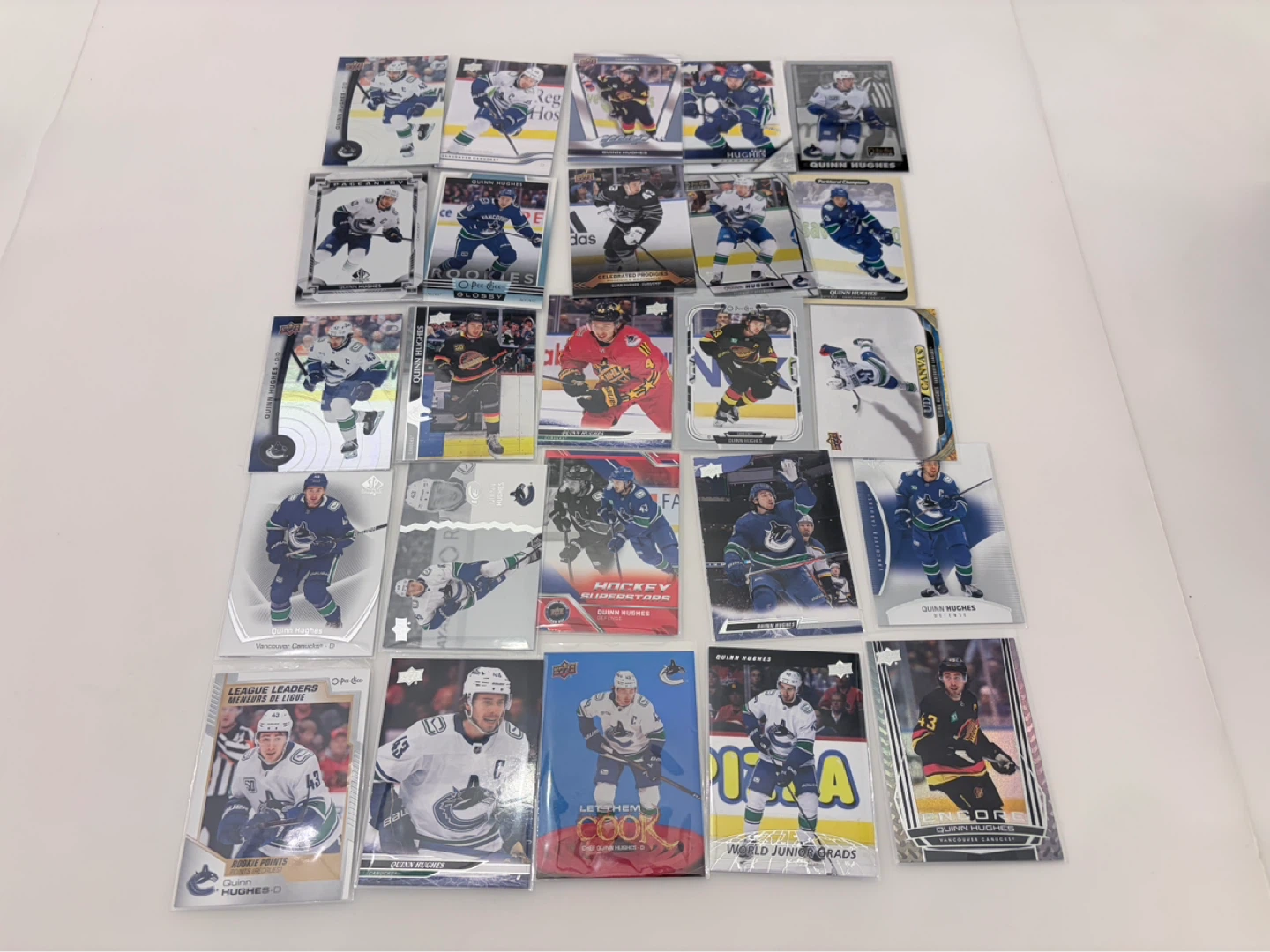 25 card lot Canucks Quinn Hughes