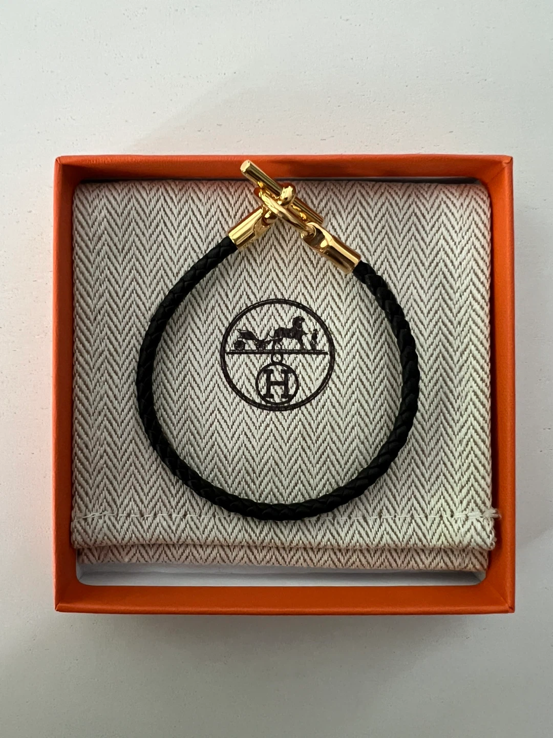 Hermès Black Braided Leather and Gold Tone Bracelet