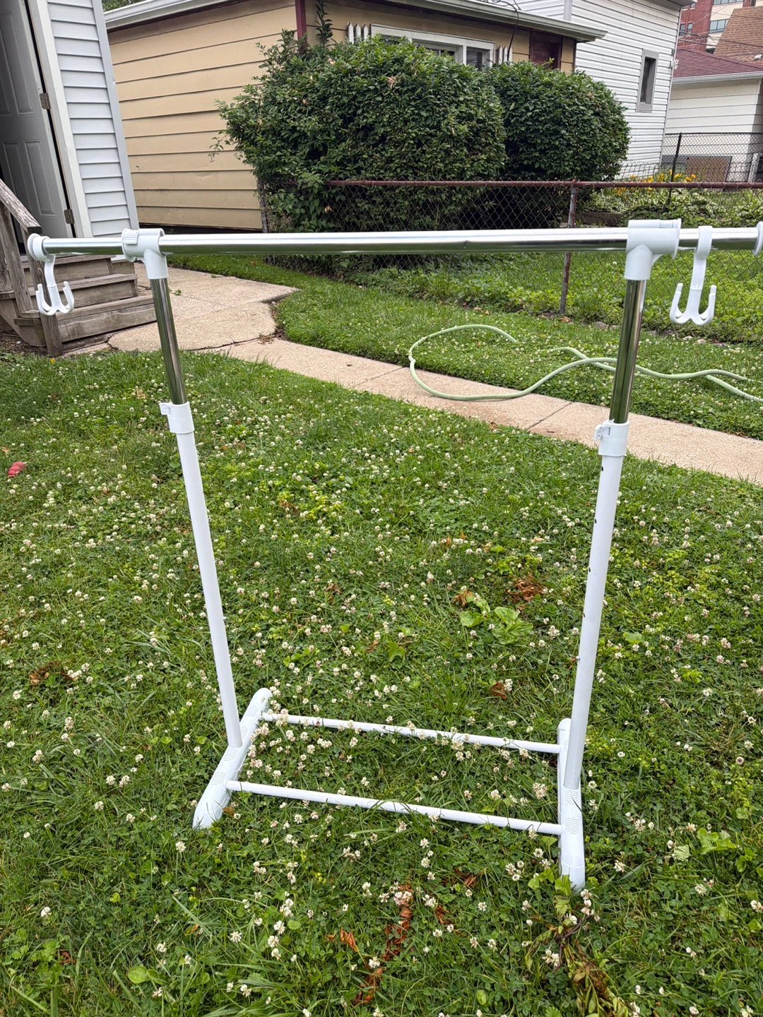 Adjustable Rolling Garment Rack with Hooks