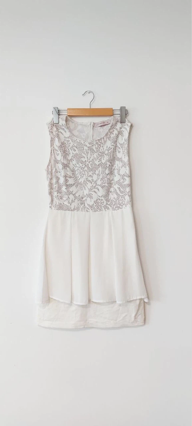 White sleeveless dress with lace detail