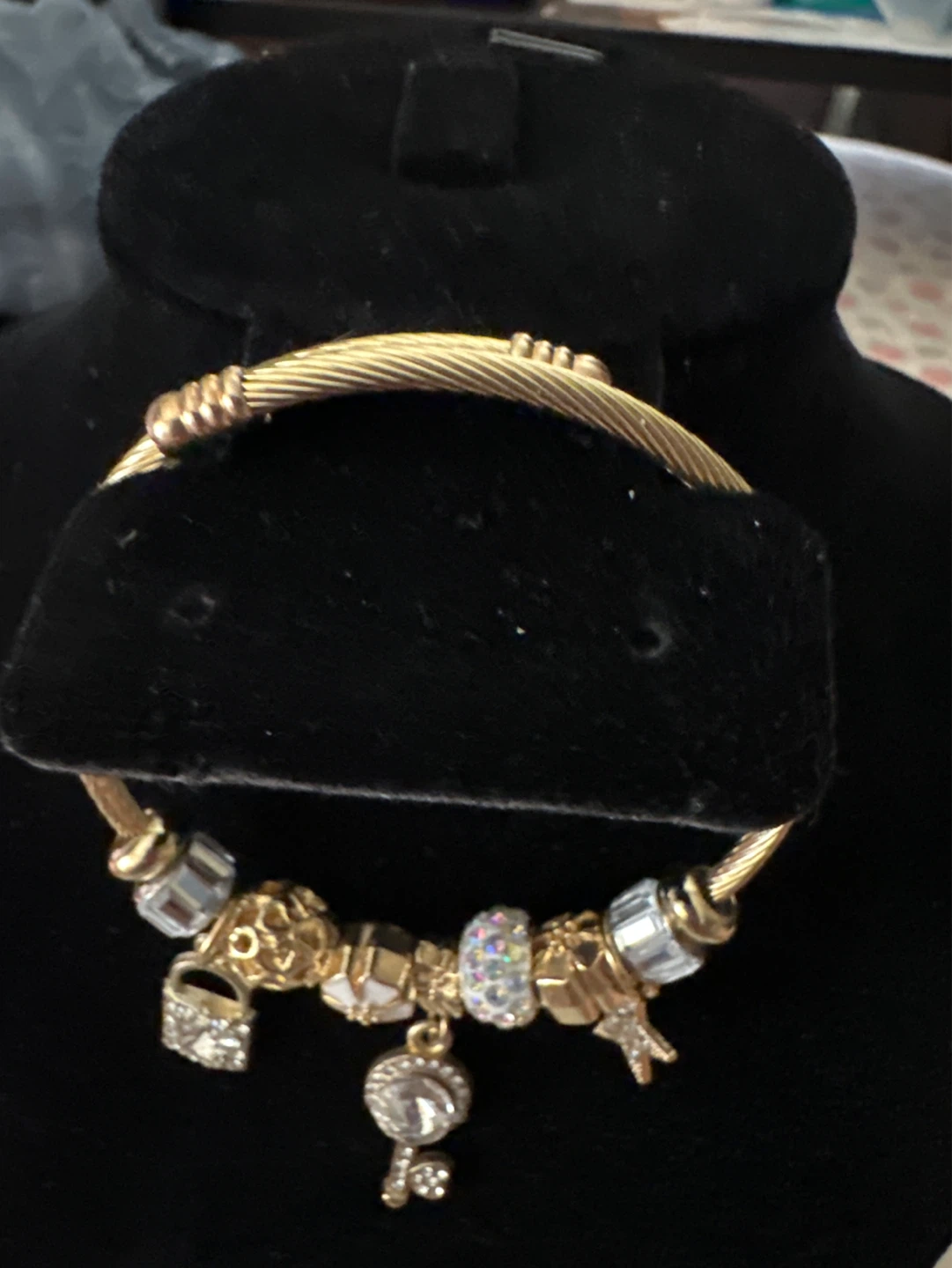Gold Tone Charm Bracelet with Key, Lock, Star, and Flower - photo 3