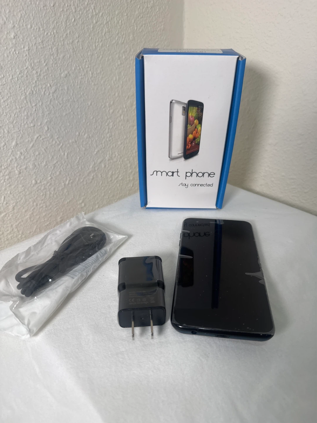 LG Aristo smartphone with charger and box - photo 3