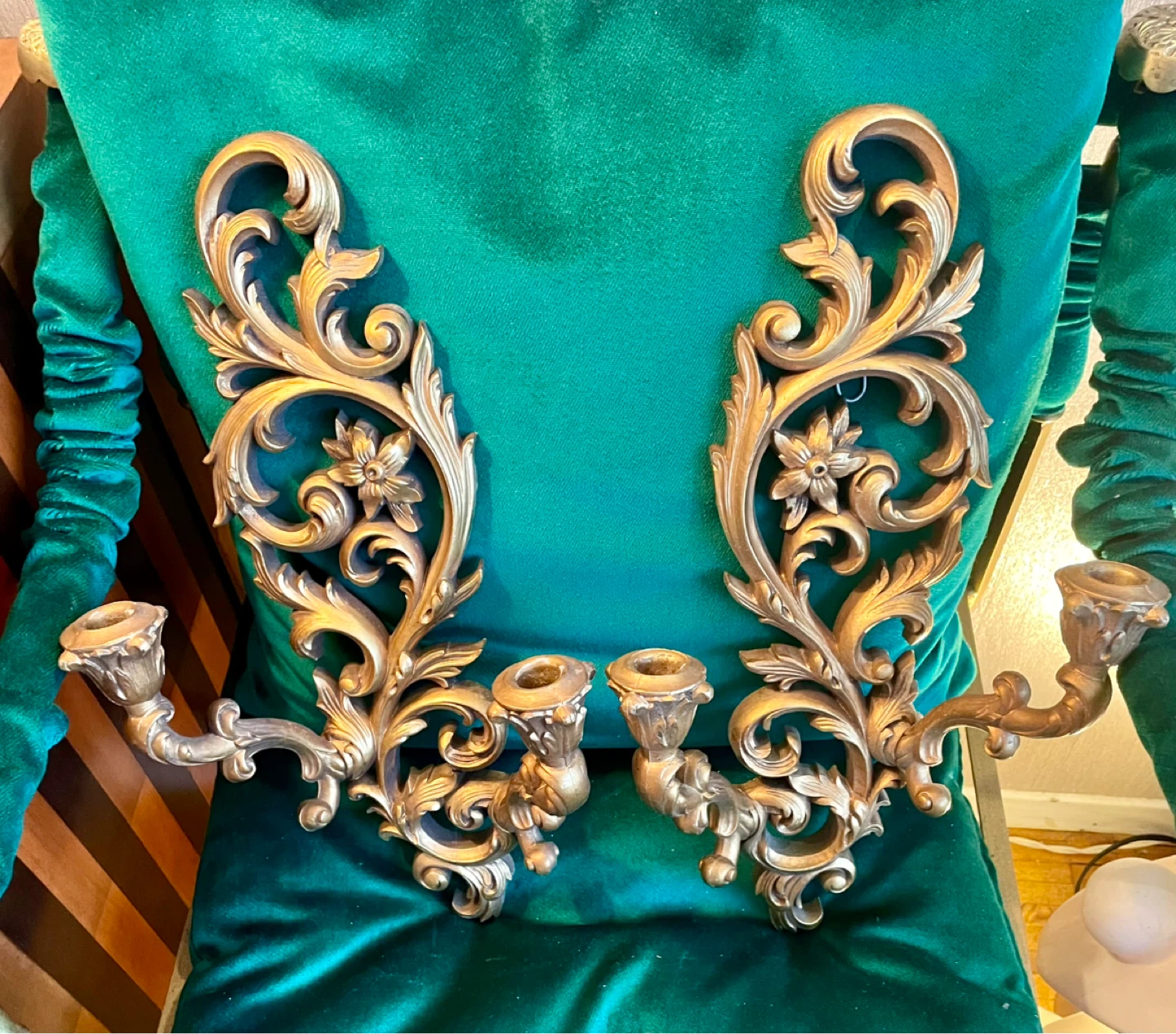 Ornate gold  candle holders and shelf