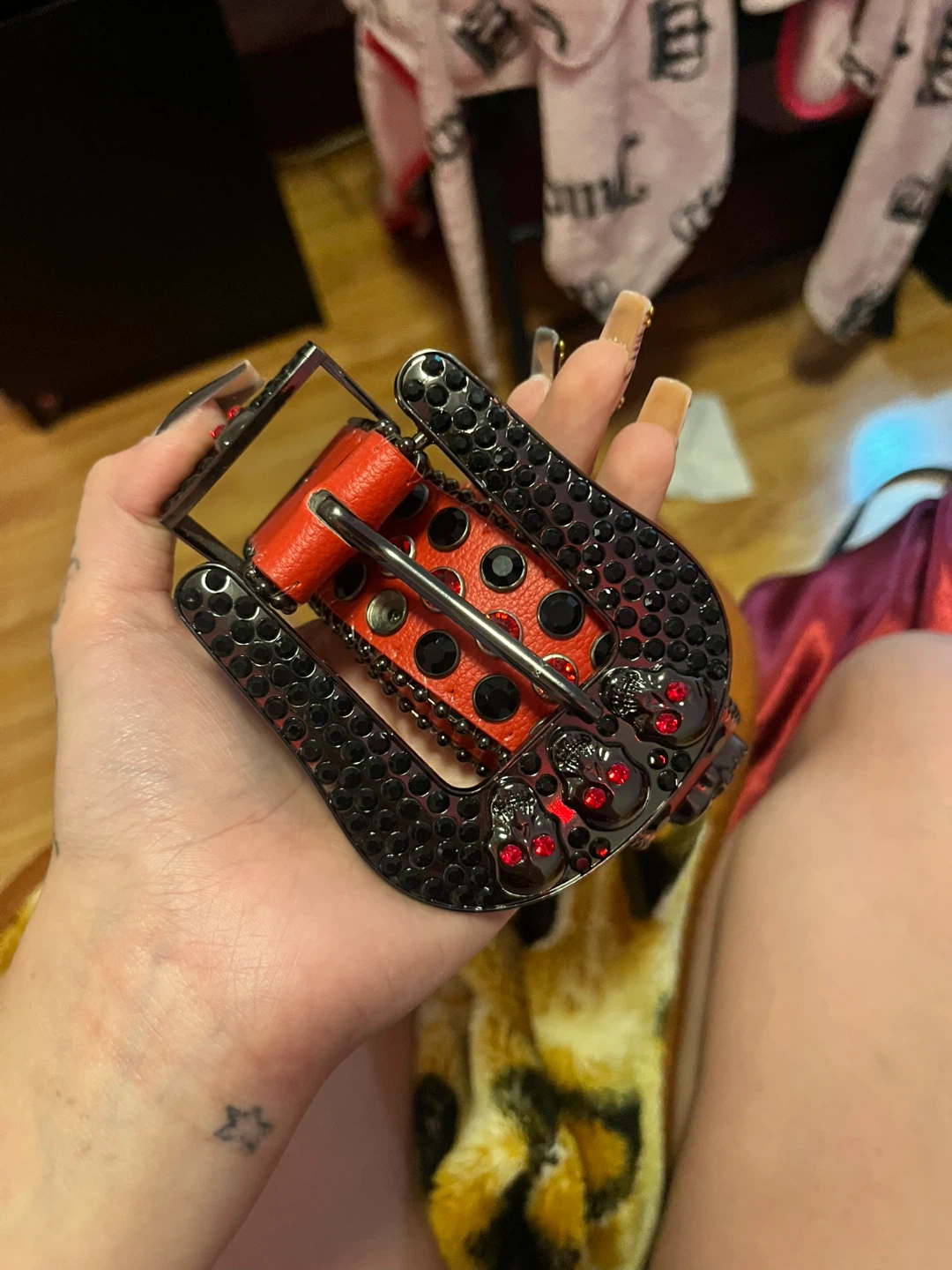 Red studded belt with skull buckle 3ft long