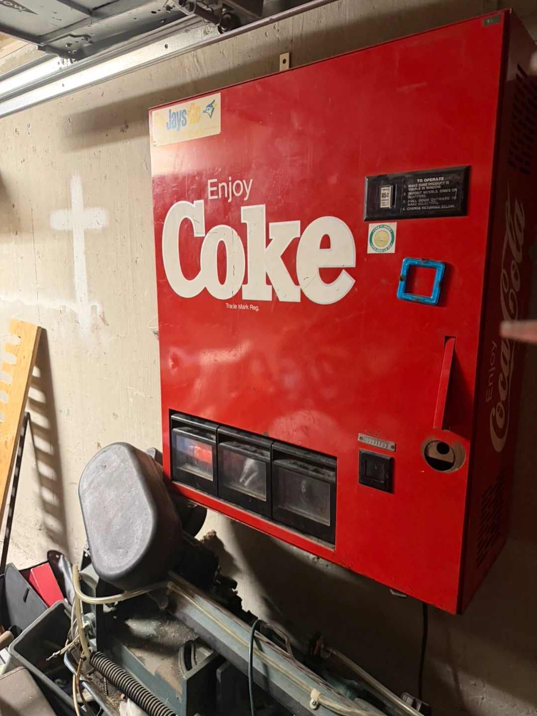 Vintage Coca-Cola and black Vending Machines