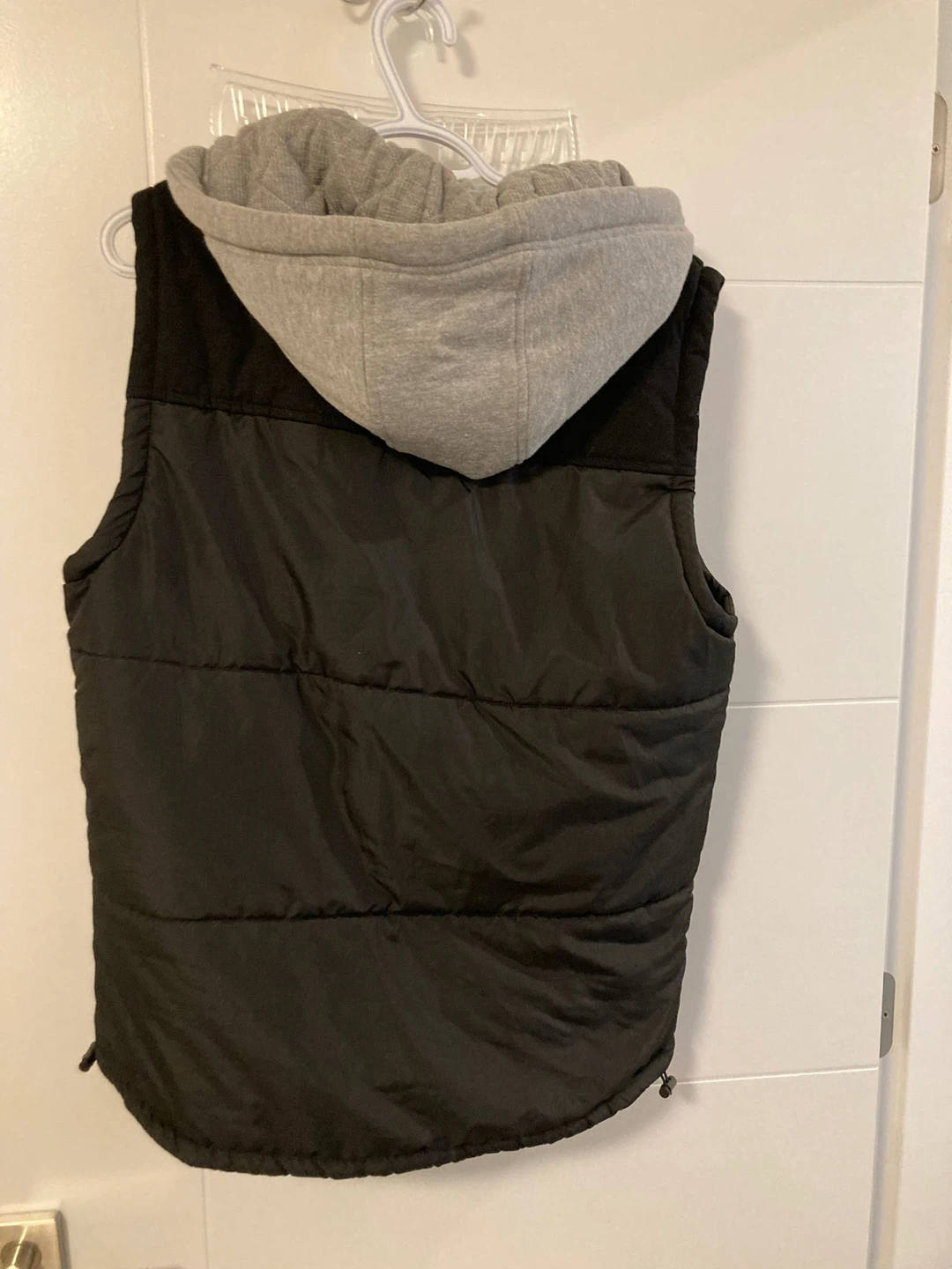 Authentic grey and black puffer vest with hood