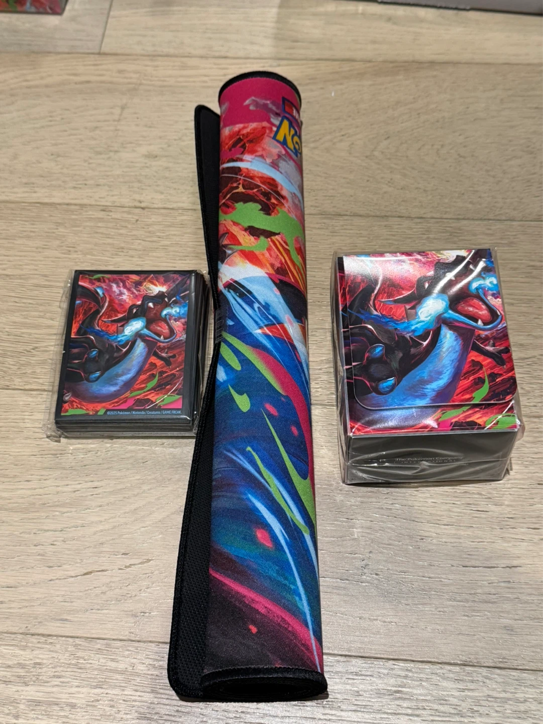 Phantasmal Charizard UPC accessories playmat, deck box, sleeve