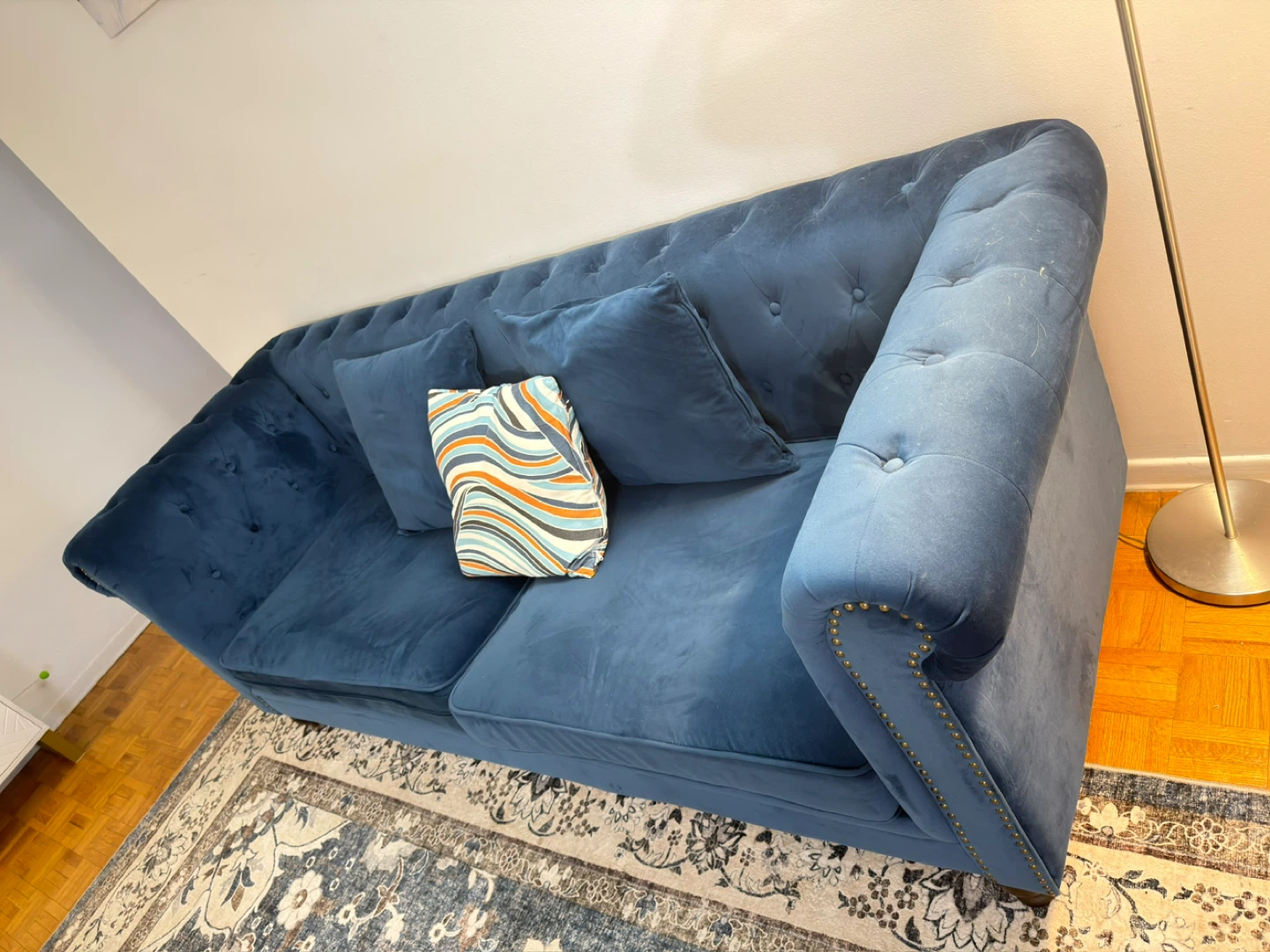 Blue Tufted Sofa with Decorative Pillows - photo 3