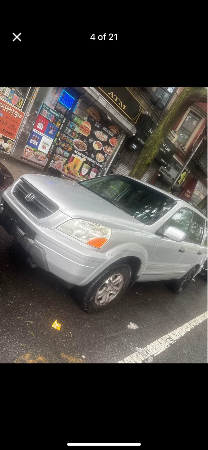 Silver Honda Pilot SUV - photo 2