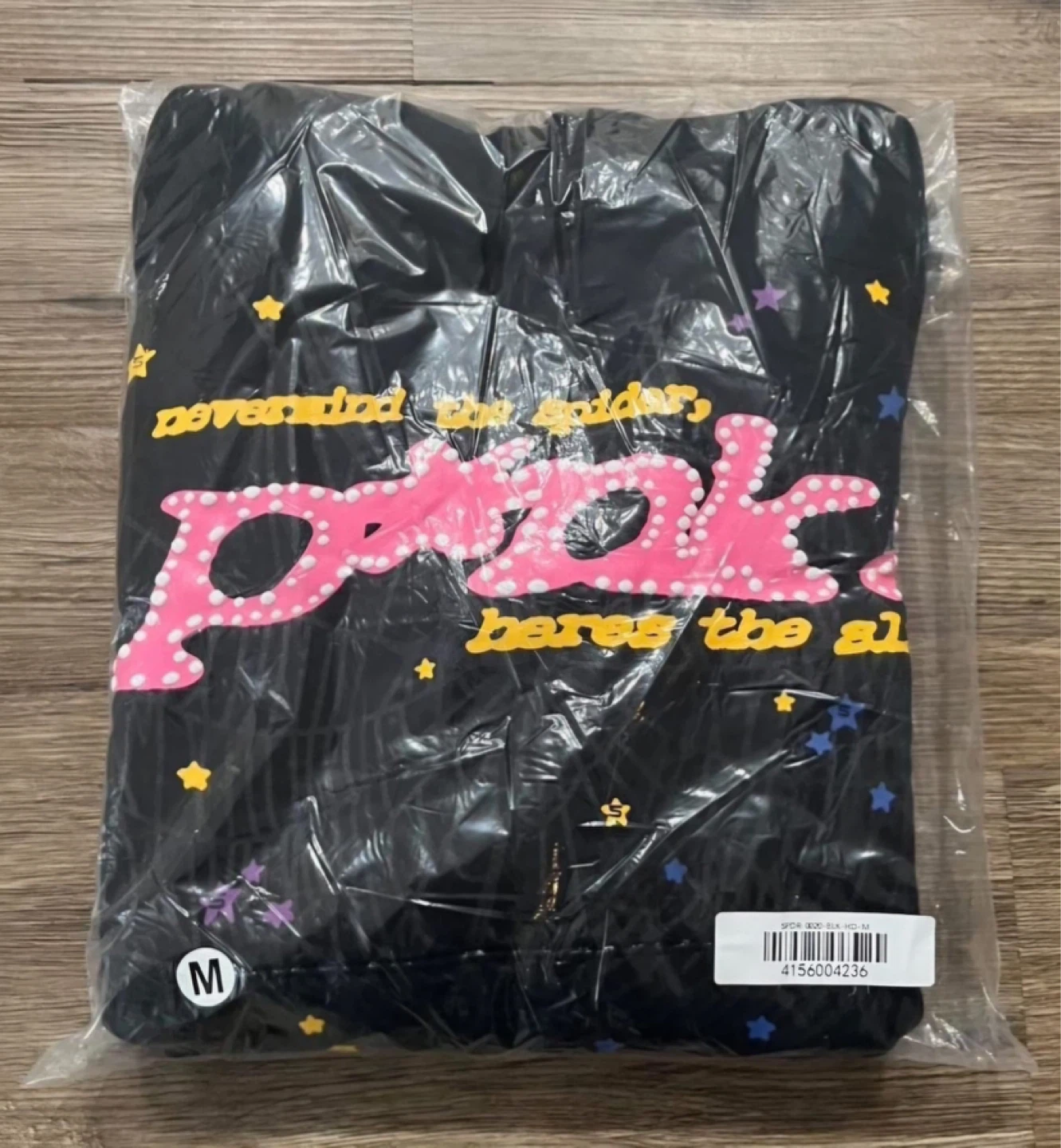 Black Hoodie with Pink Spiders Web Graphic