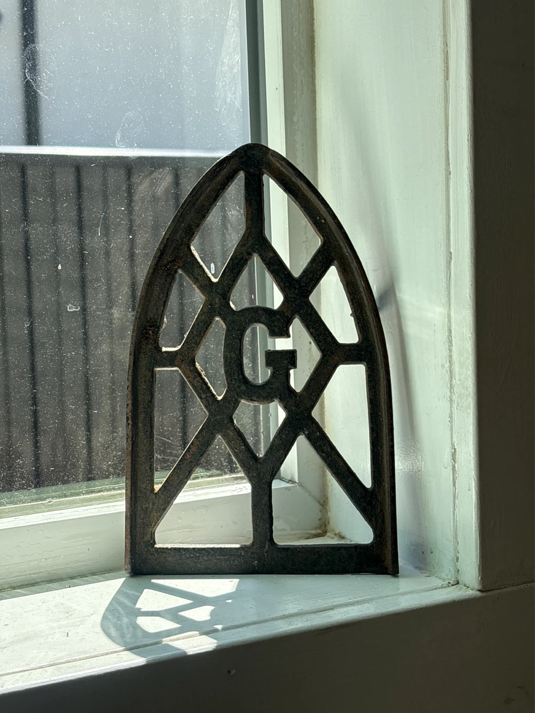 Cast Iron decor. Decorative "G"