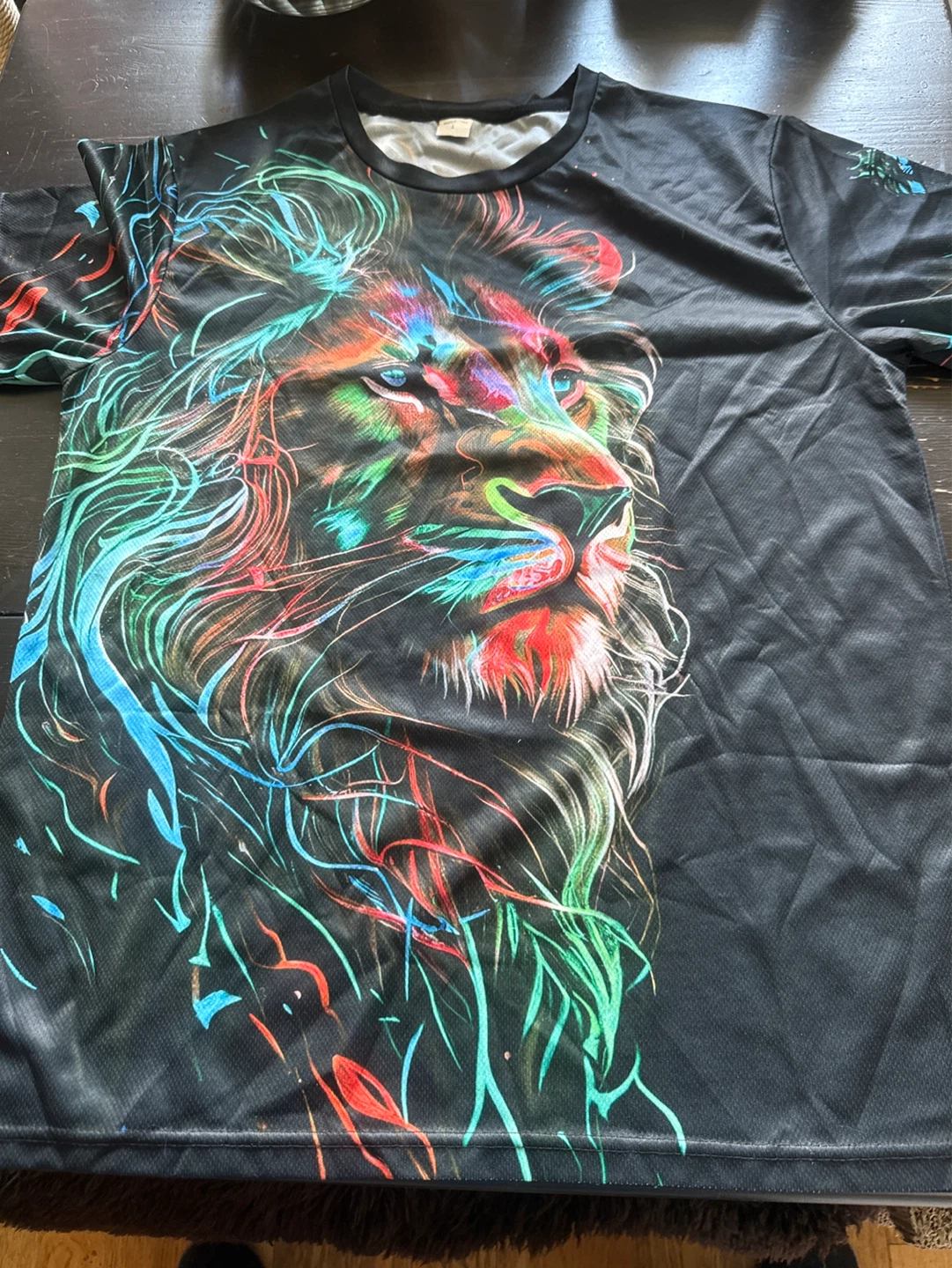 ⚽️ Black T-Shirt with Colourful Lion Graphic