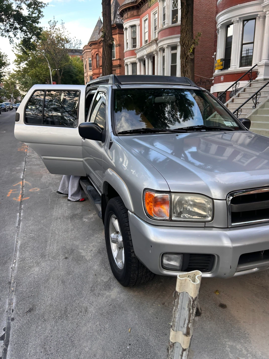 Silver Nissan Pathfinder SUV - photo 4