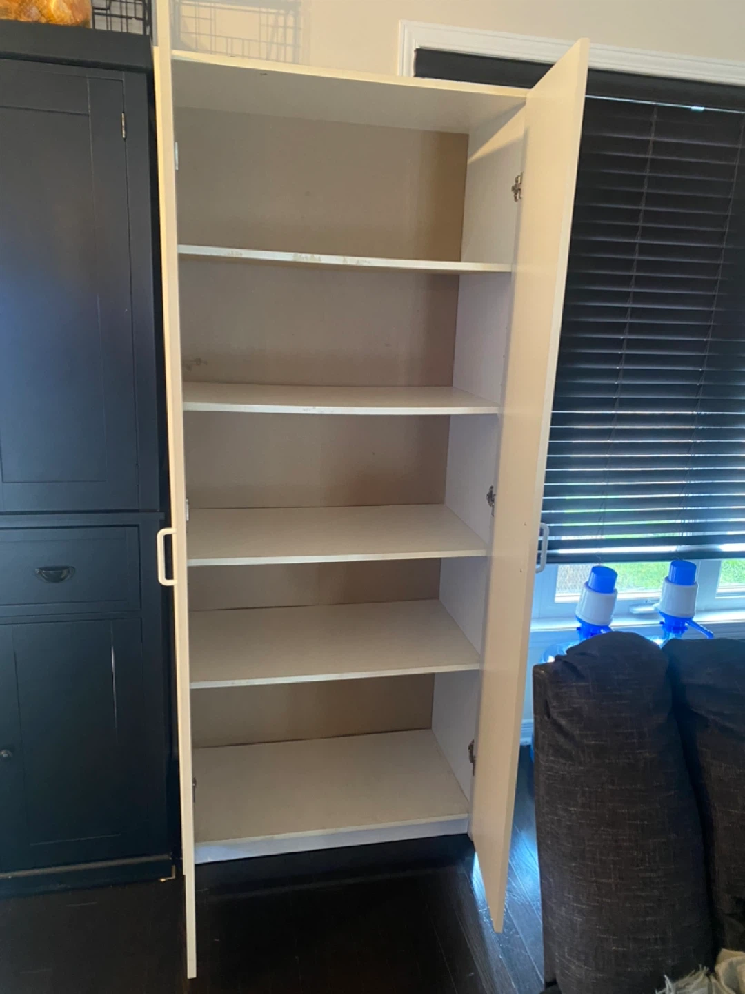 Tall White Storage Cabinet