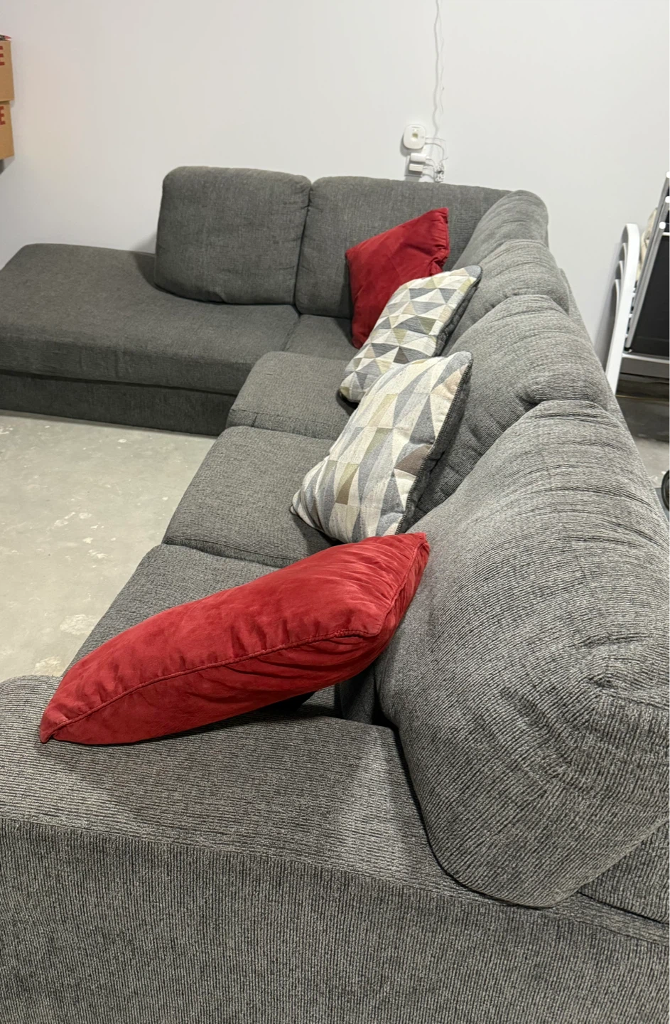 Grey Sectional Sofa with Red and Geometric Pillows - photo 4