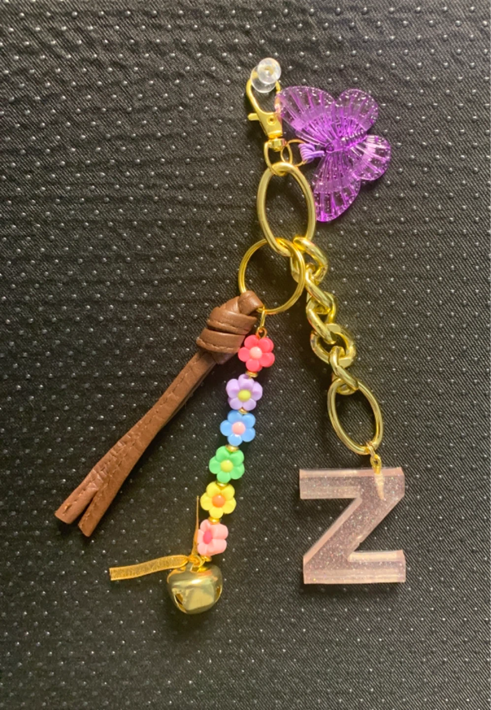 Keychain with "Z" initial, butterfly, and flower charms
