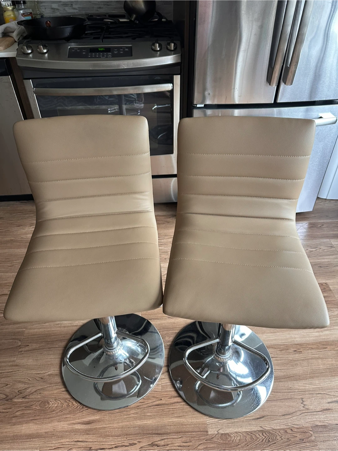 Set of 2 Tan Faux Leather Adjustable Bar Stools
