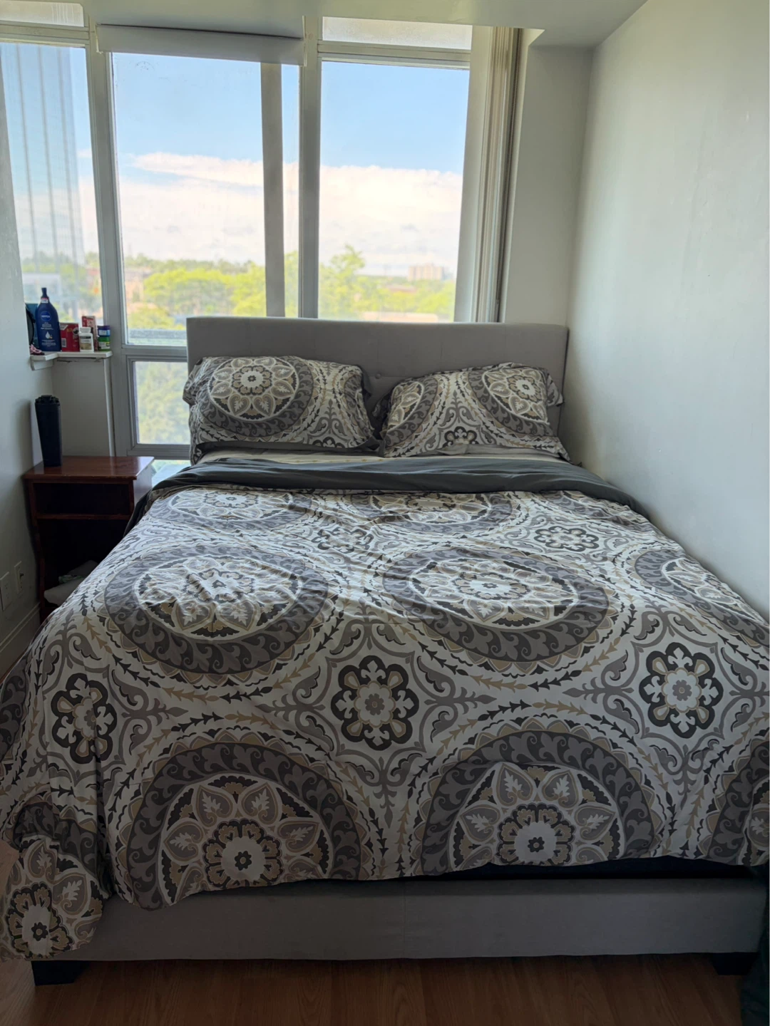 Wayfair’s Grey Tufted Headboard Bed Frame