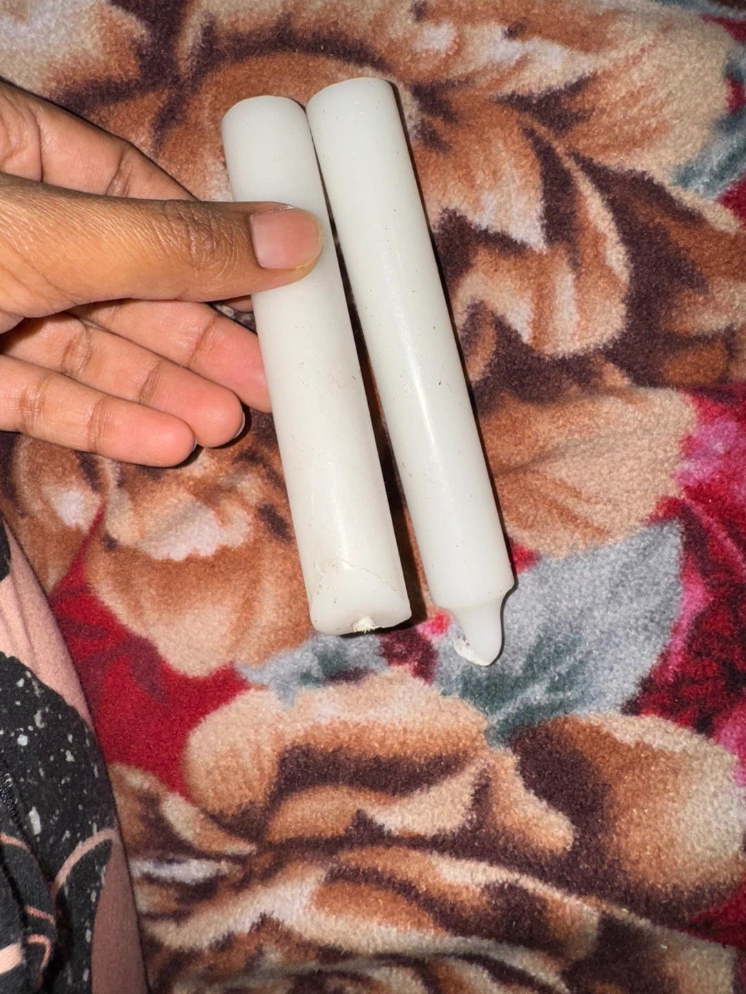 Two white taper candles