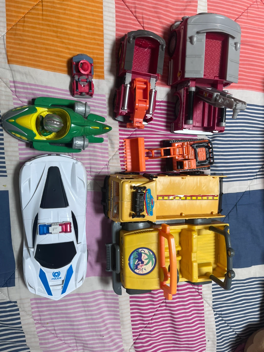 Assorted Toy Vehicles and Figure