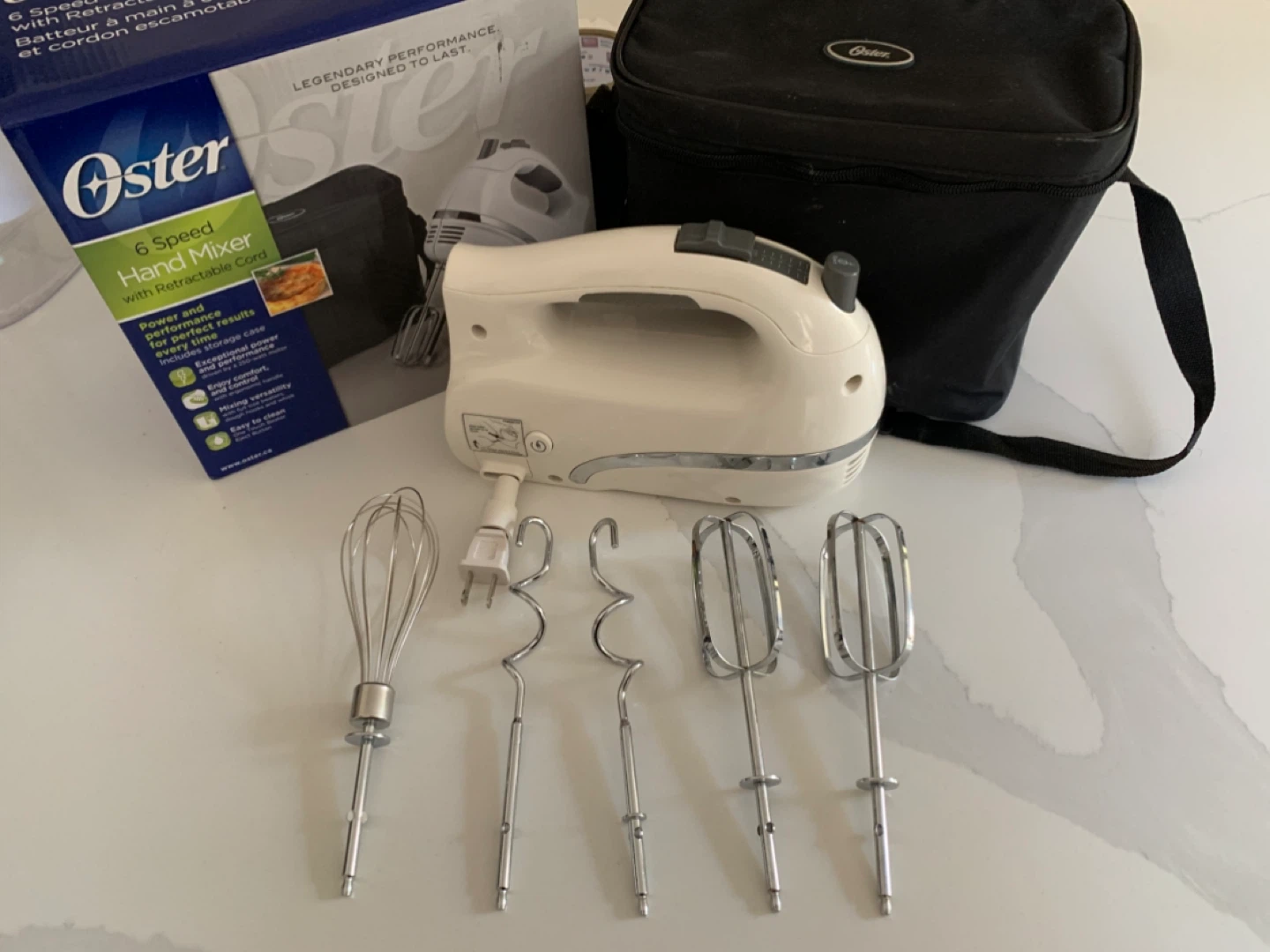 Oster 6 Speed Hand Mixer with Retractable Cord and Storage Case