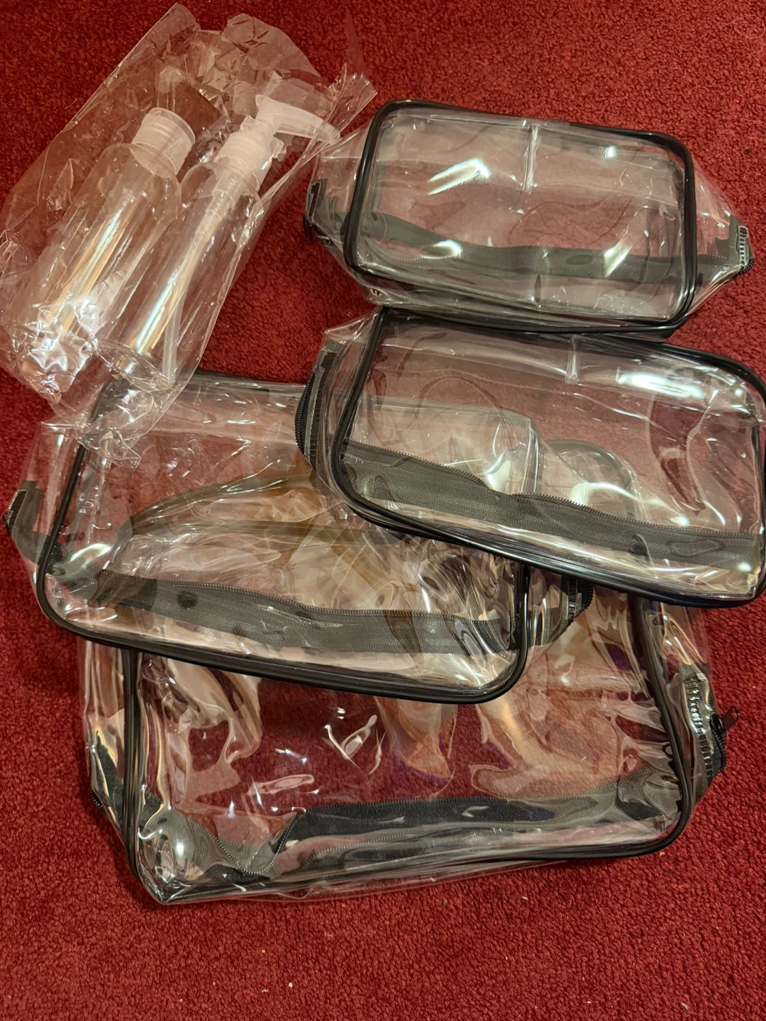 Clear Toiletry Bags and Spray Bottles Set