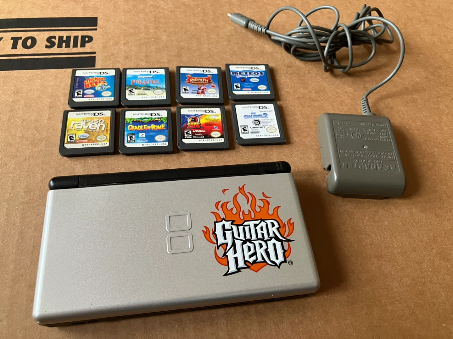 Nintendo DS Lite Guitar Hero Edition with 8 Games and Charger